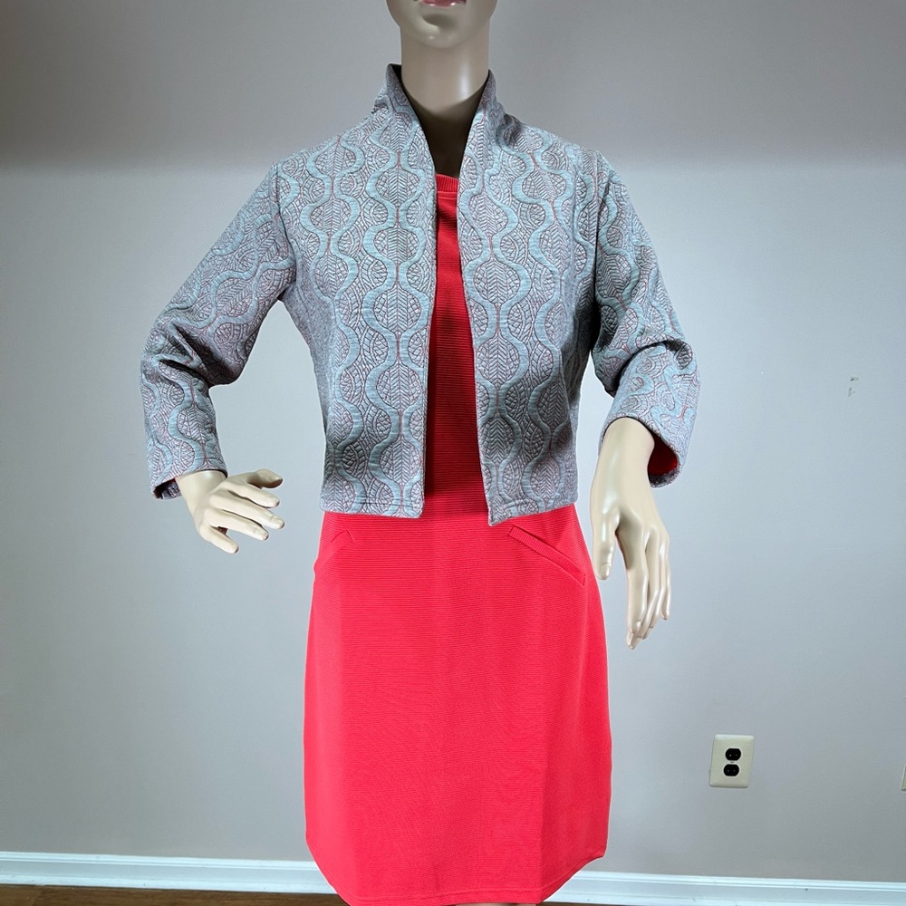 AND woven jacket in size 10.